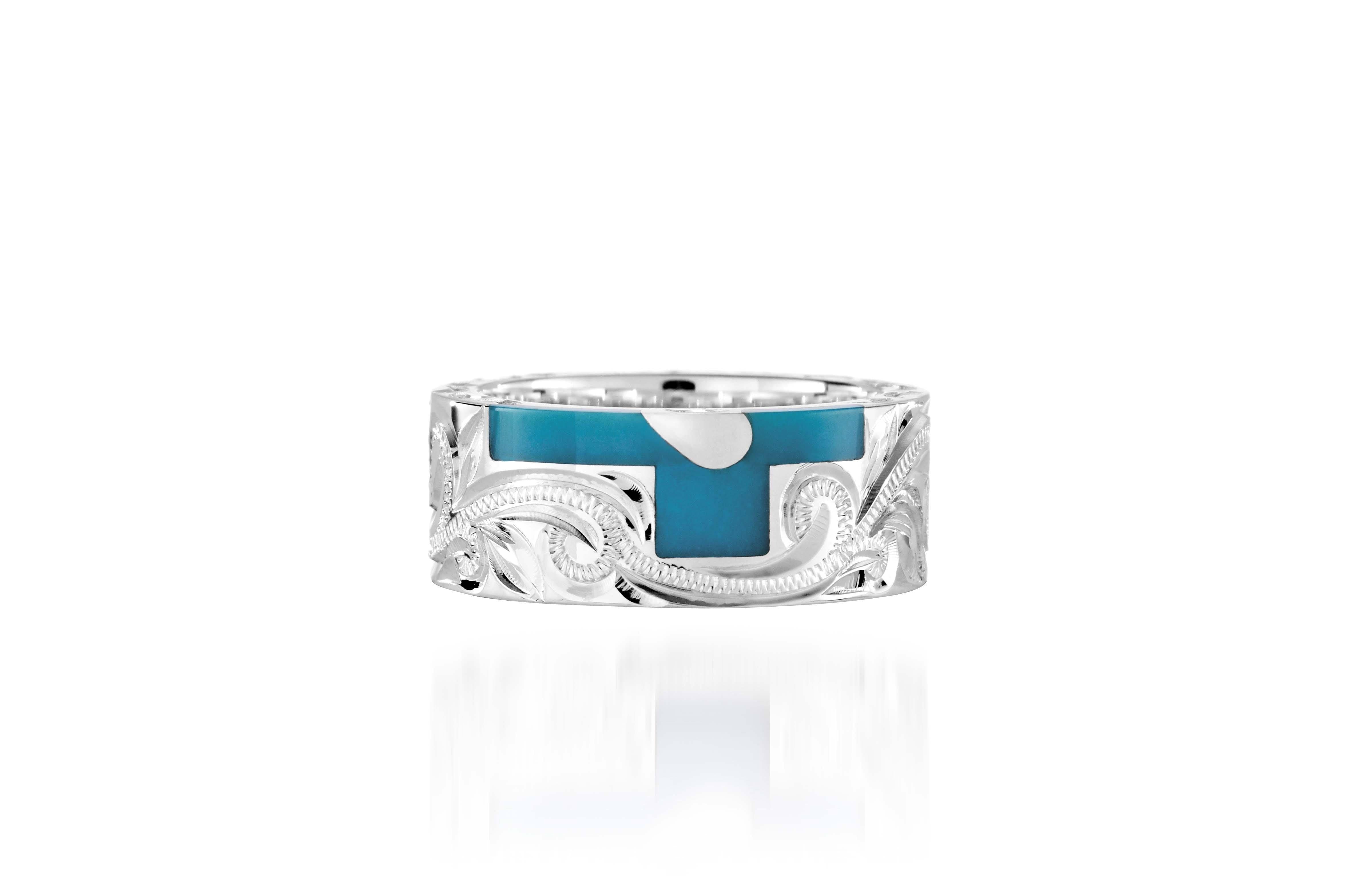 The picture shows a part of a set 925 sterling silver right half cross ring with hand-engravings, heart, and a turquoise gemstone.