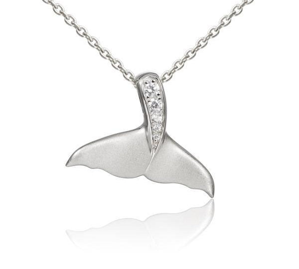 The picture shows a 925 sterling silver whale tail pendant with topaz.