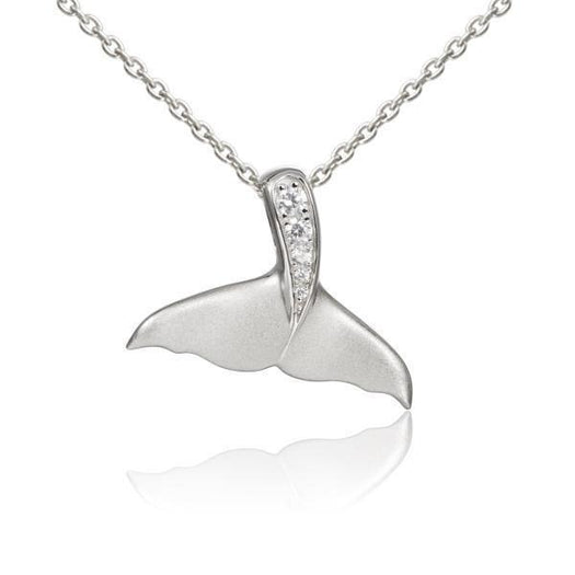 The picture shows a 925 sterling silver whale tail pendant with topaz.