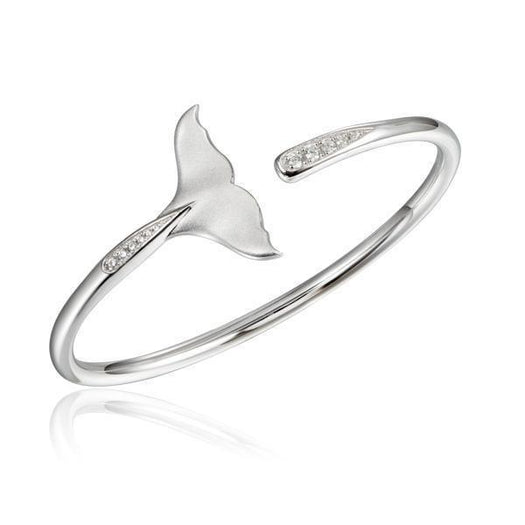 The picture shows a 925 sterling silver whale tail bangle with topaz.